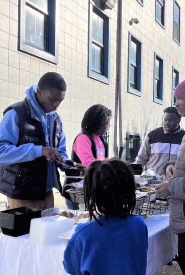 Royal Athletes Feed the Community